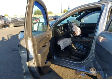 2014 Jeep Grand Cherokee Overland z USA, uszkodzony, nr VIN 1C4RJECTXEC212434